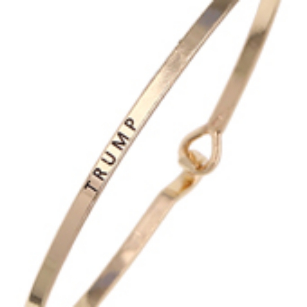 Gold tone TRUMP bracelet